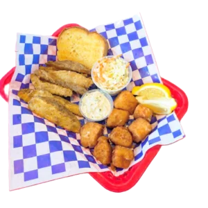 A basket of fried seafood with hush puppies and bread.