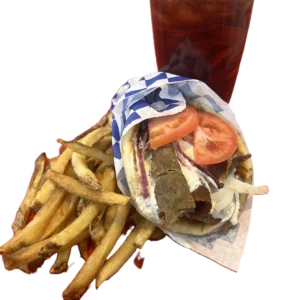 A delicious sandwich with fries and a drink.